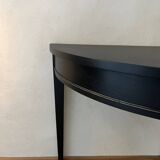 Black half-moon console