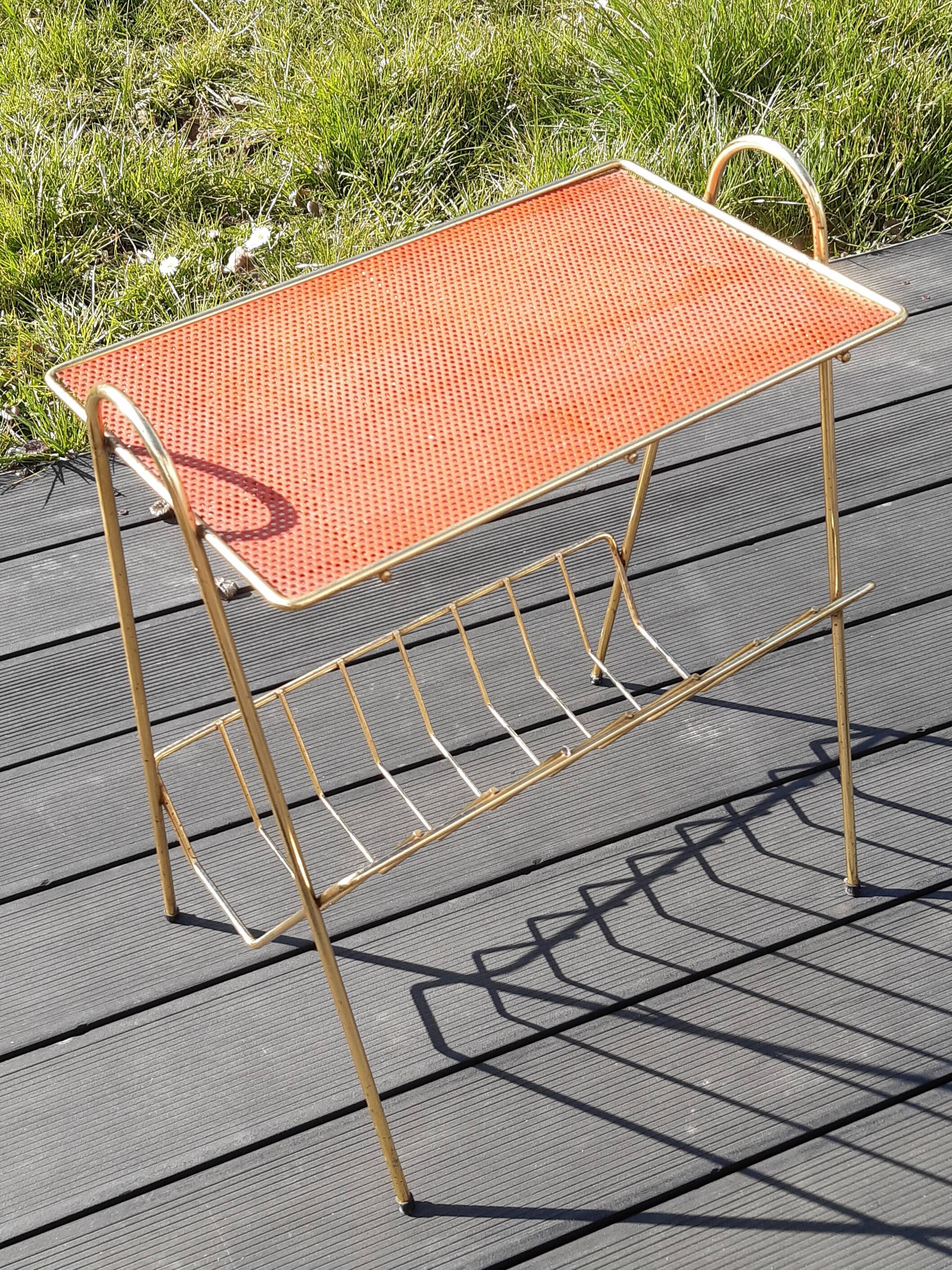 Perforated sheet metal magazine rack in the style of Mathieu Mategot, 1950s