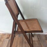 Folding chair caned from the 70s
