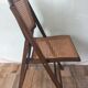 Folding chair caned from the 70s