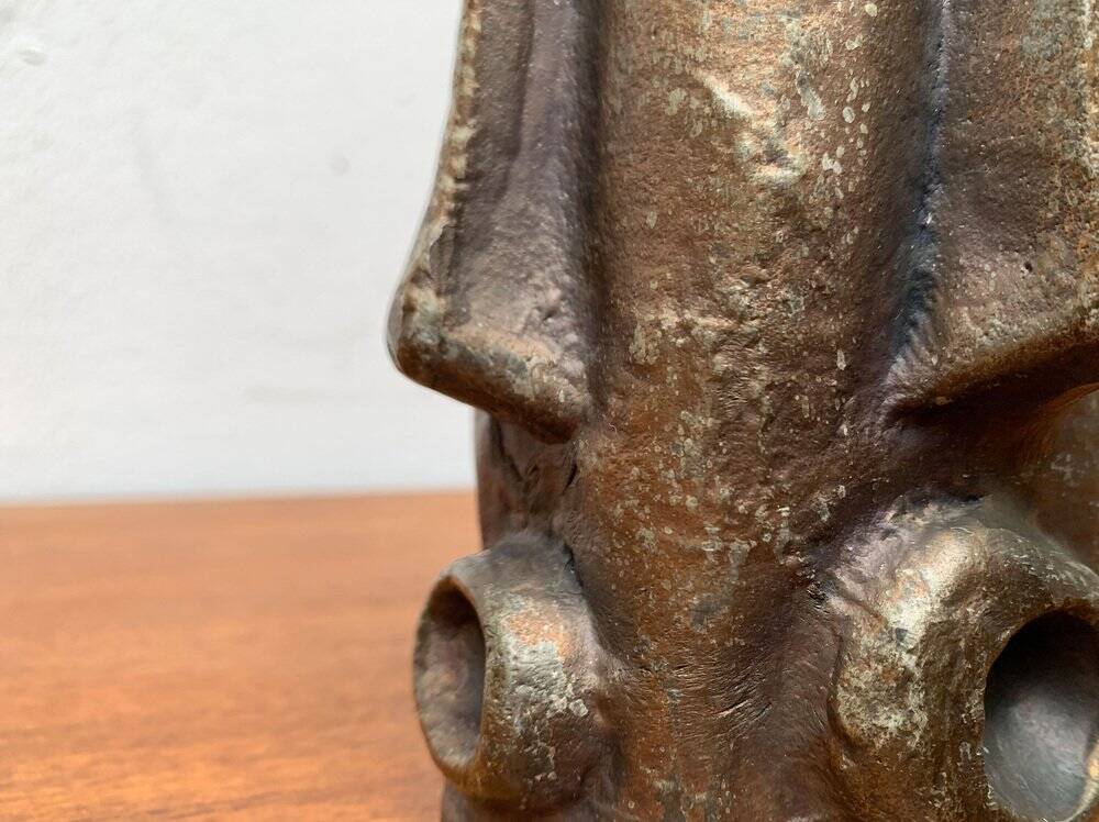 Abstract vase with a brutalist bronze face from the mid-century.