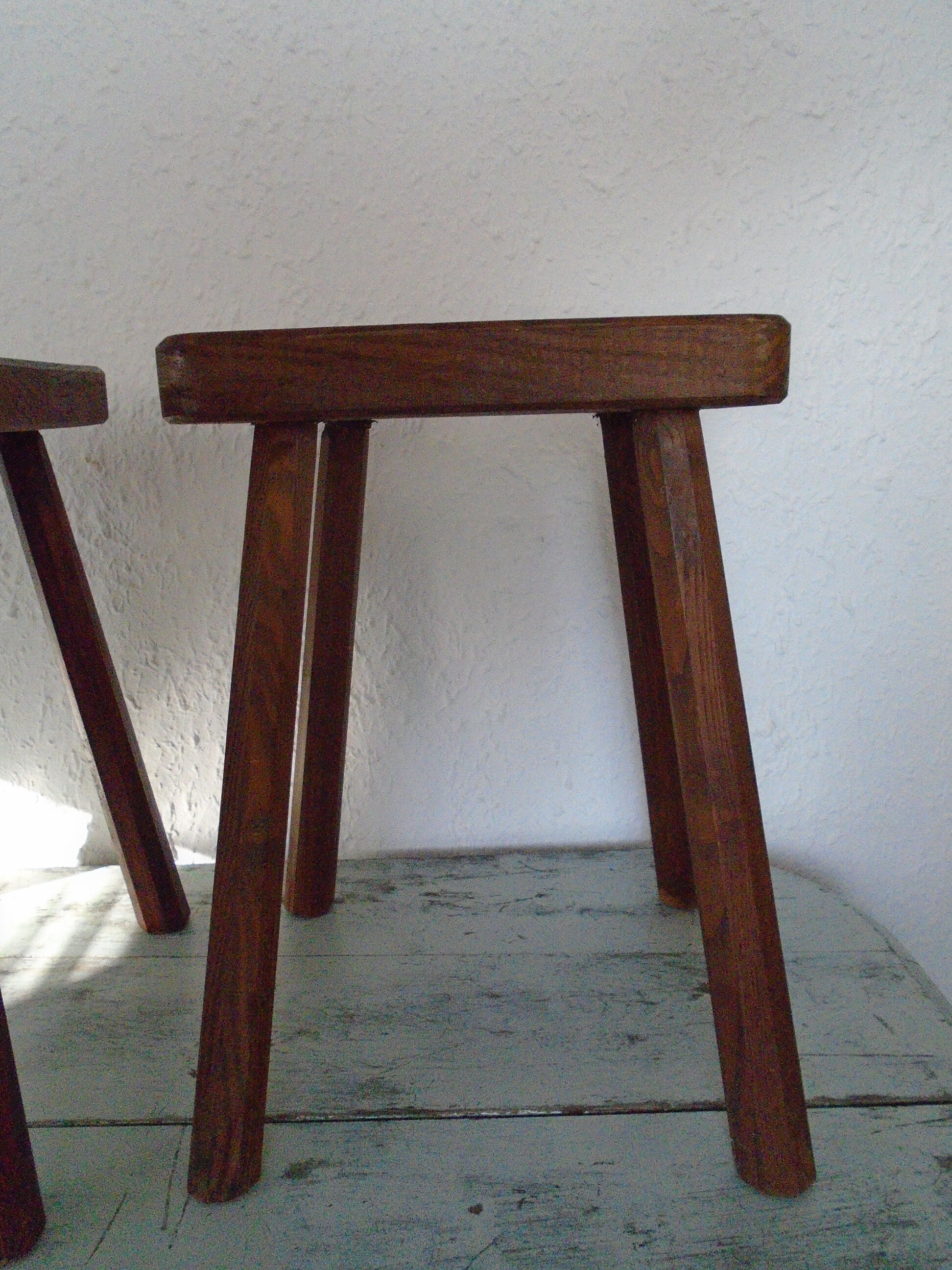 2 ancient brutalist wood stools