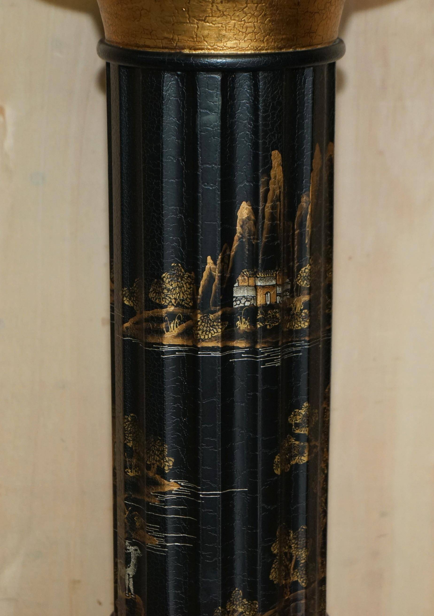 Pair of lacquered torchère columns in Chinoiserie neoclassical style.
