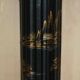 Pair of lacquered torchère columns in Chinoiserie neoclassical style.
