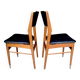 Pair of Scandinavian chairs in wood and black skai