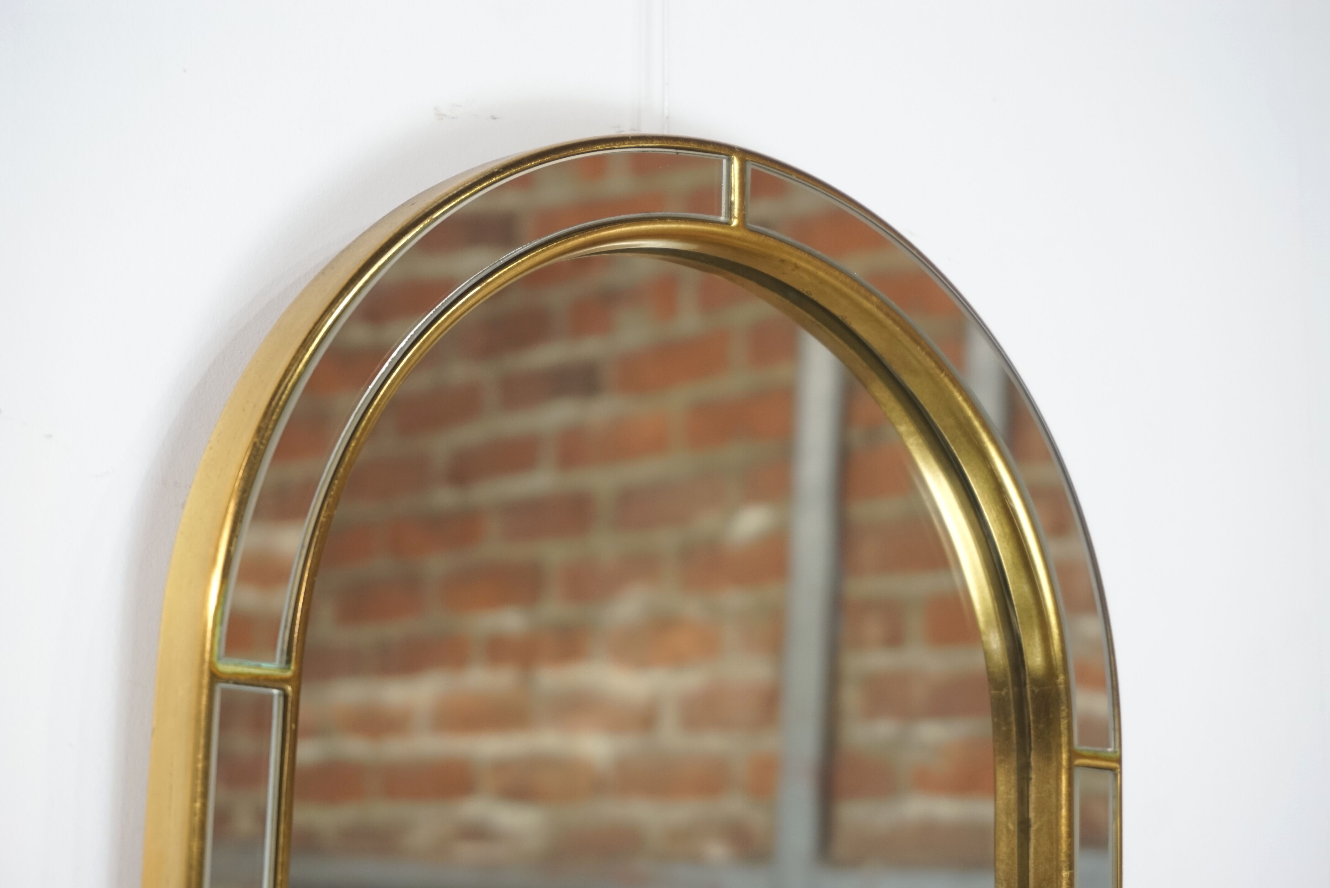 Mirror arcade and firewall by Deknudt