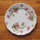 Round dish scalloped in polychrome iron earth decorated with dahlias