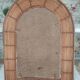 Vintage rattan arch mirror medium honey burnt leaf and metal decoration