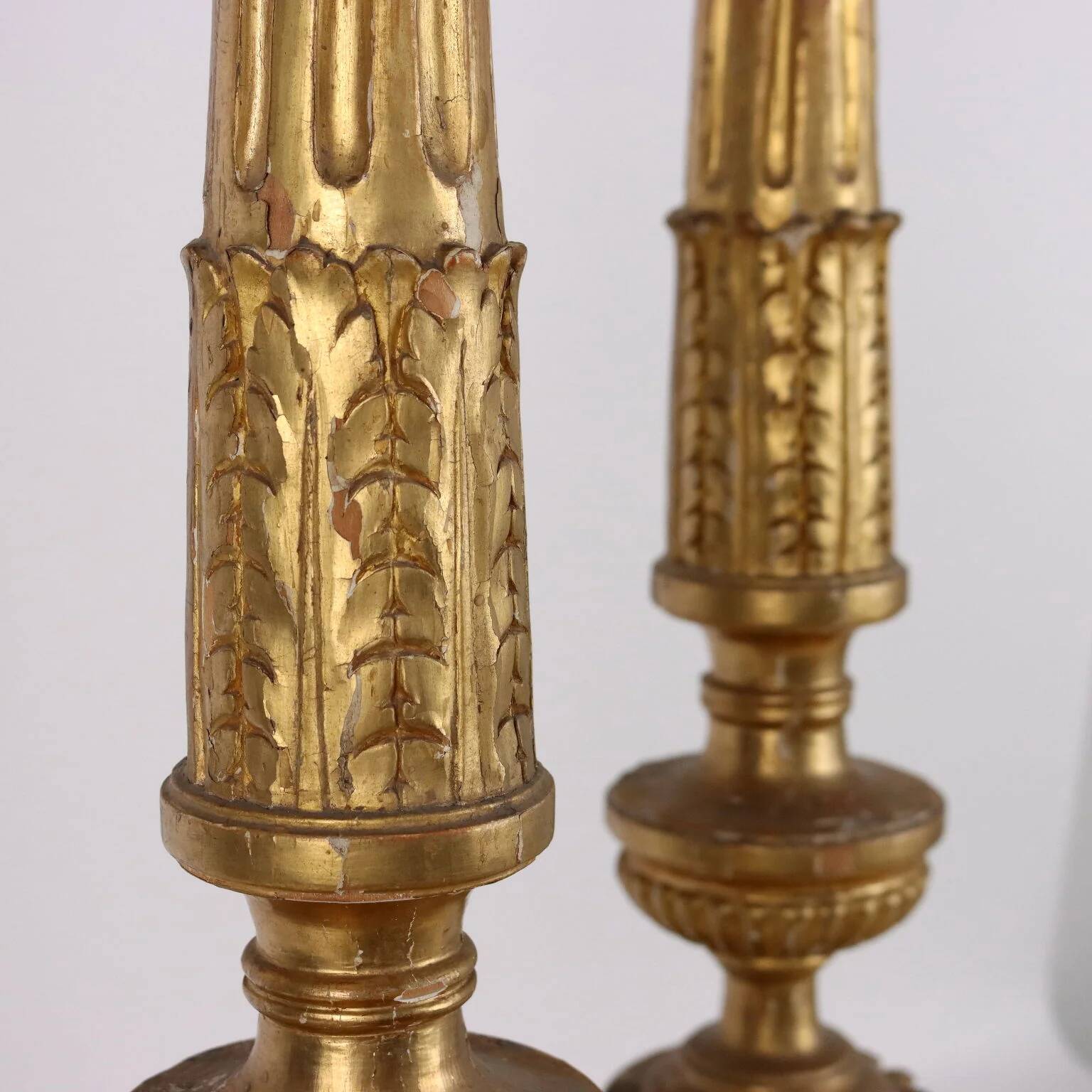Pair of antique Empire candlesticks in wood, Europe, early 19th century.
