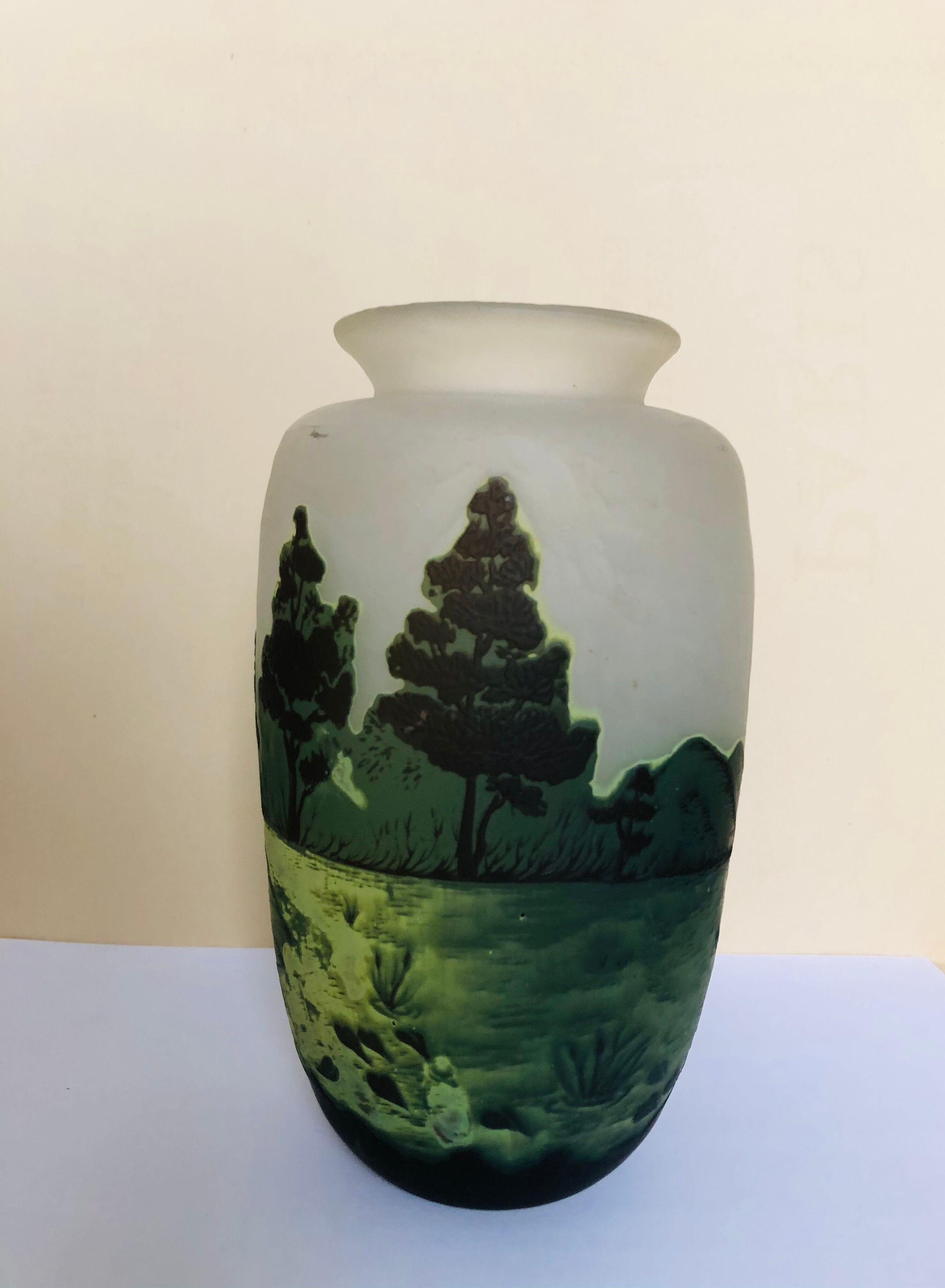 Multilayered glass vase engraved with acid