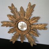 Sun mirror in gilded wood