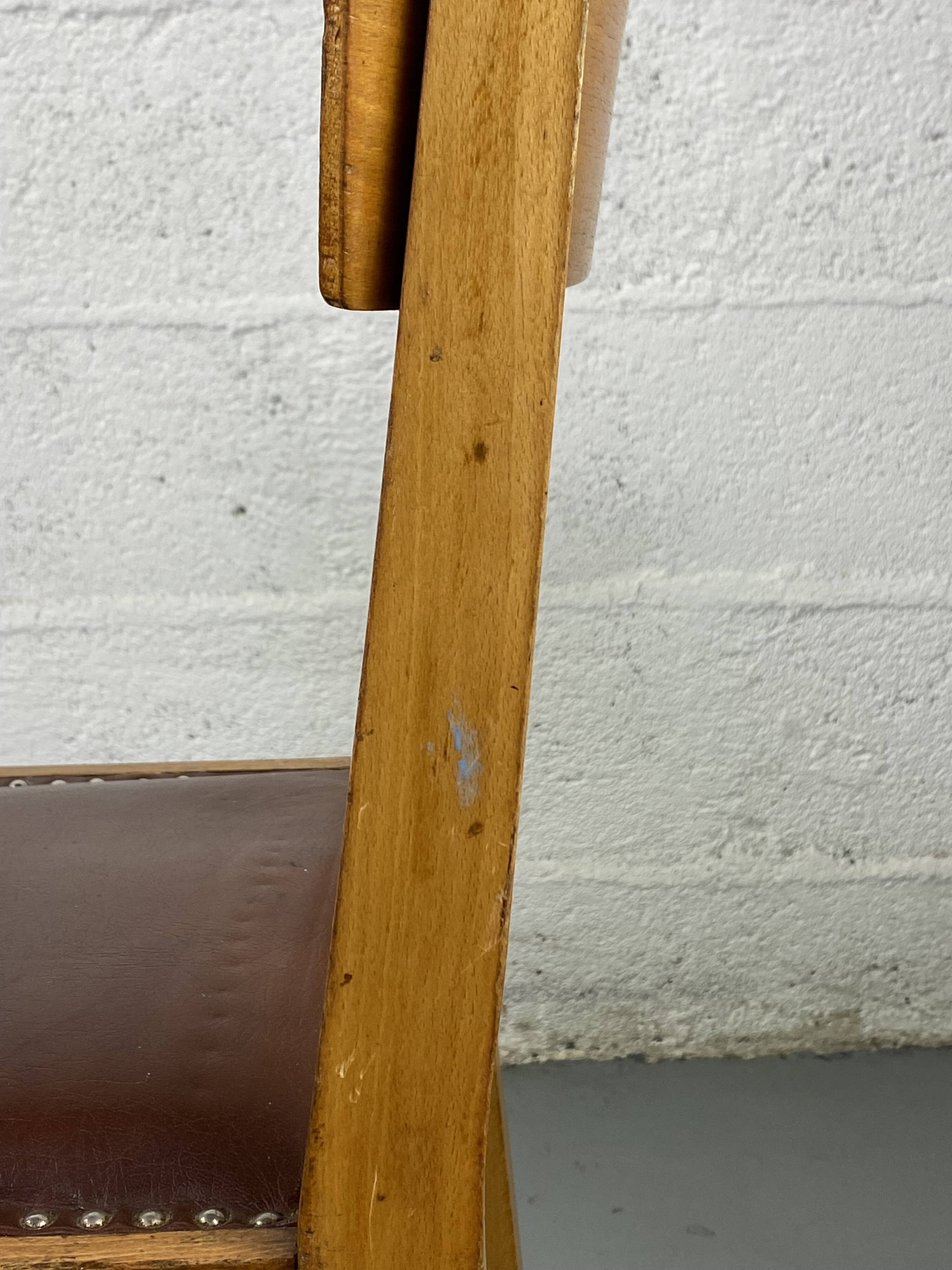 Pair of wooden and leather chairs