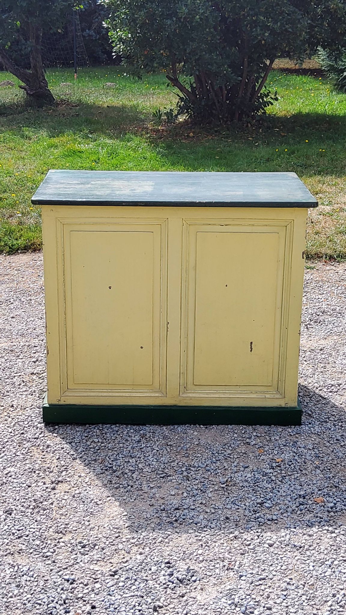 Late 19th century grocery counter in green and yellow patina painted wood