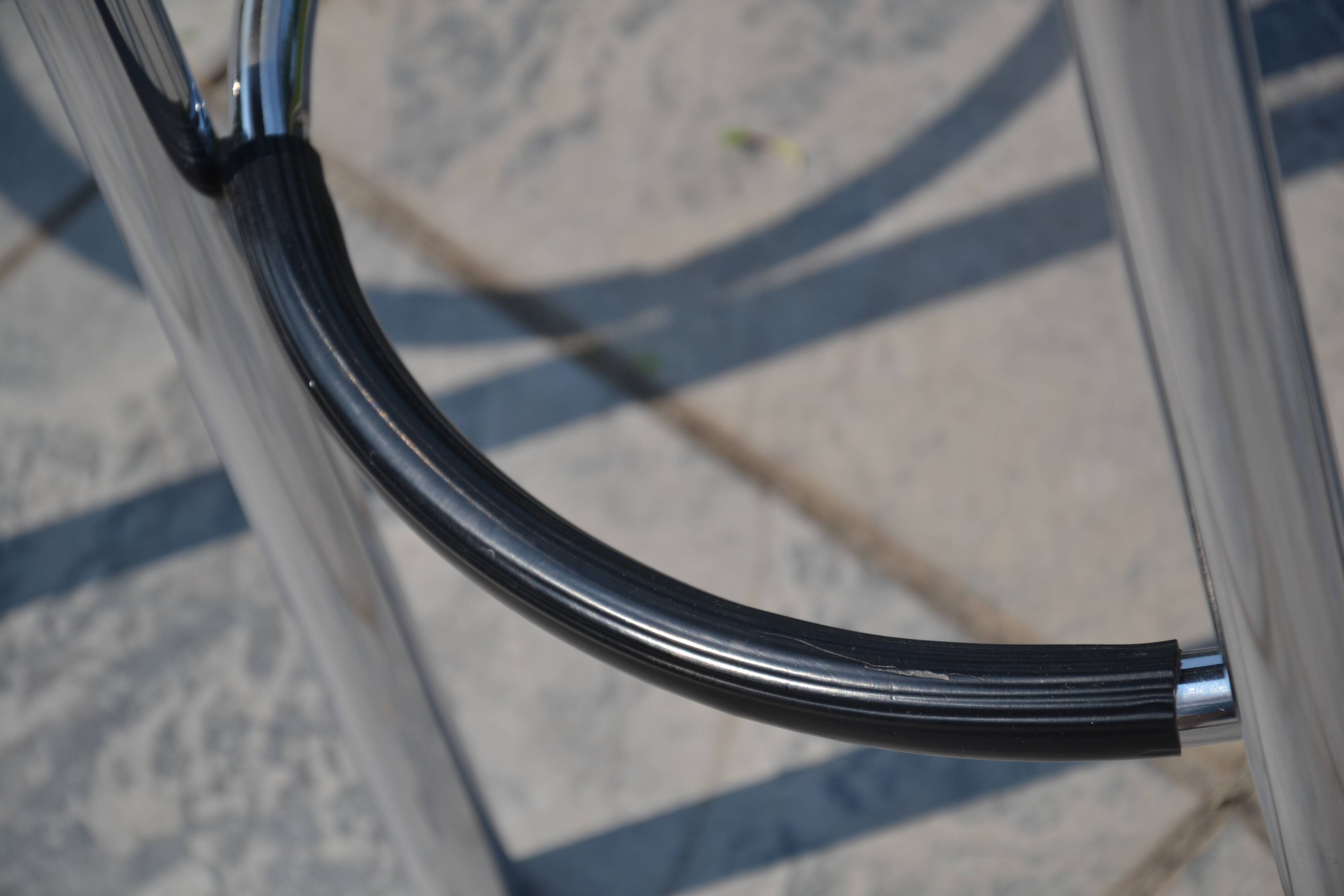 2 "Calligaris" bar stools with chrome metal and refurbished seats.