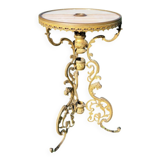 Round table in marble and gilded bronze