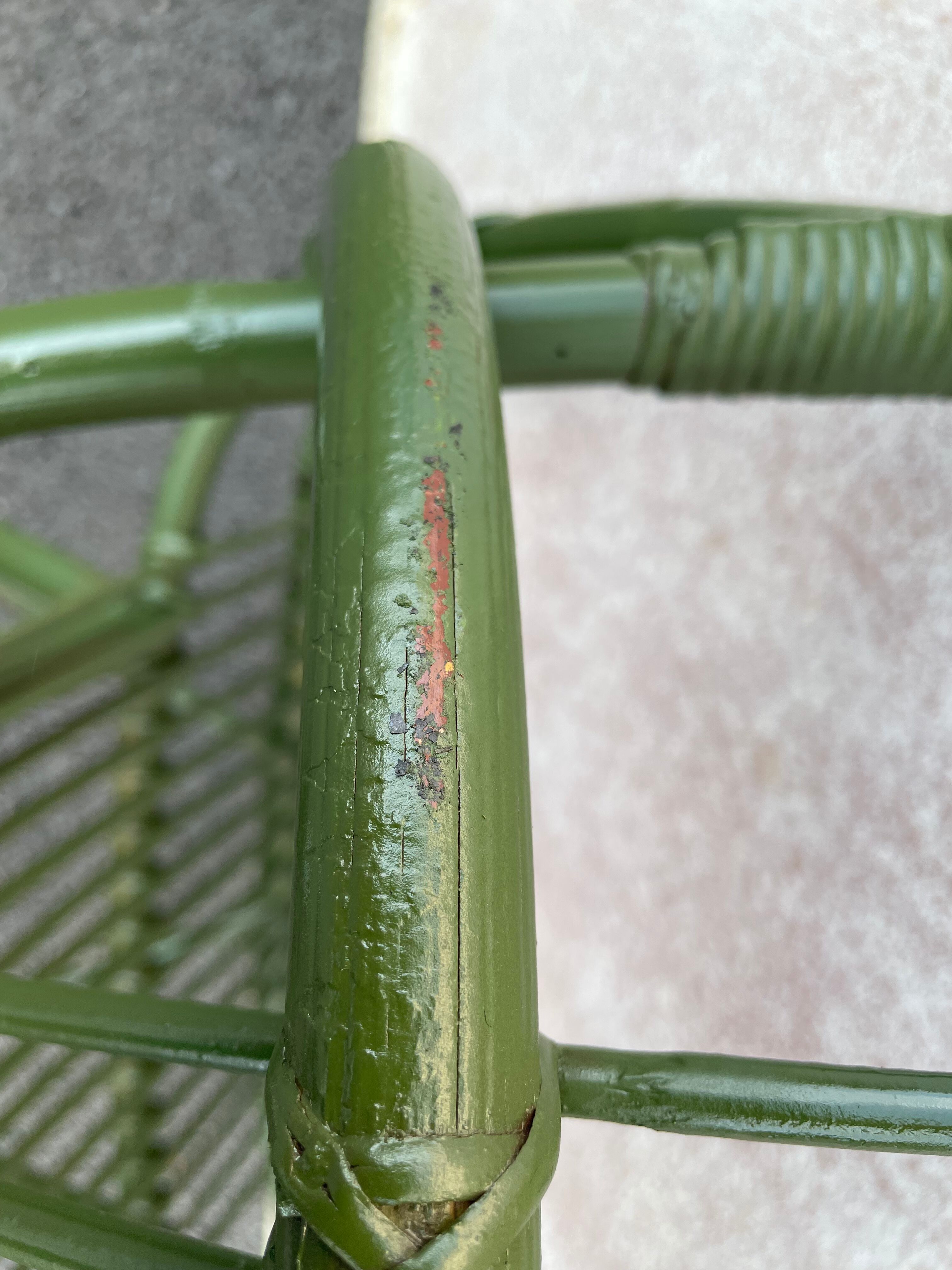 Green rattan armchair