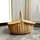Woven wicker picnic basket