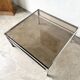 Modernist chrome and smoked glass coffee table, circa 1970