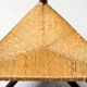 Mid Century Antiques spindle wood chaise with a rush seat.