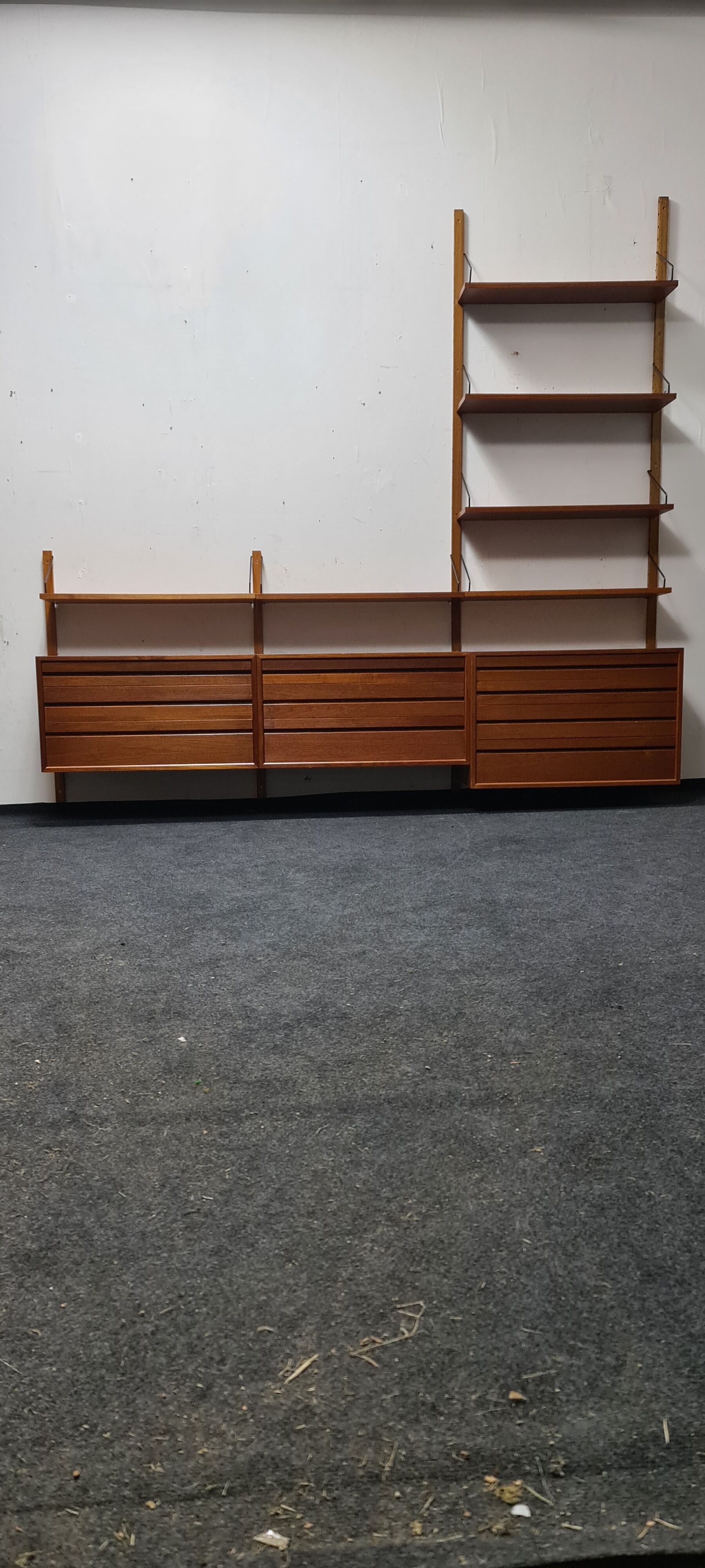 Teak wall unit by Poul Cadovious