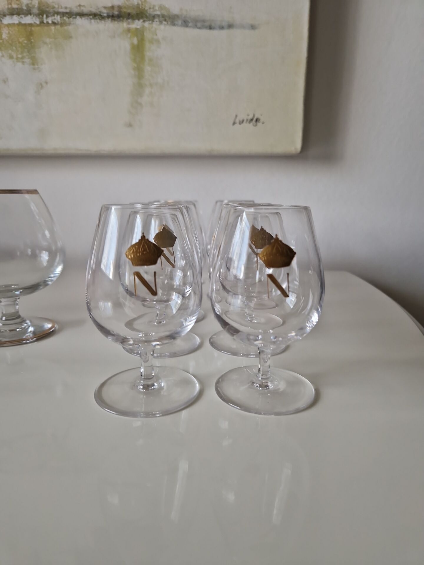 Suite de 10 verres à liqueur en cristal décor Napoléon Ier doré – cour
