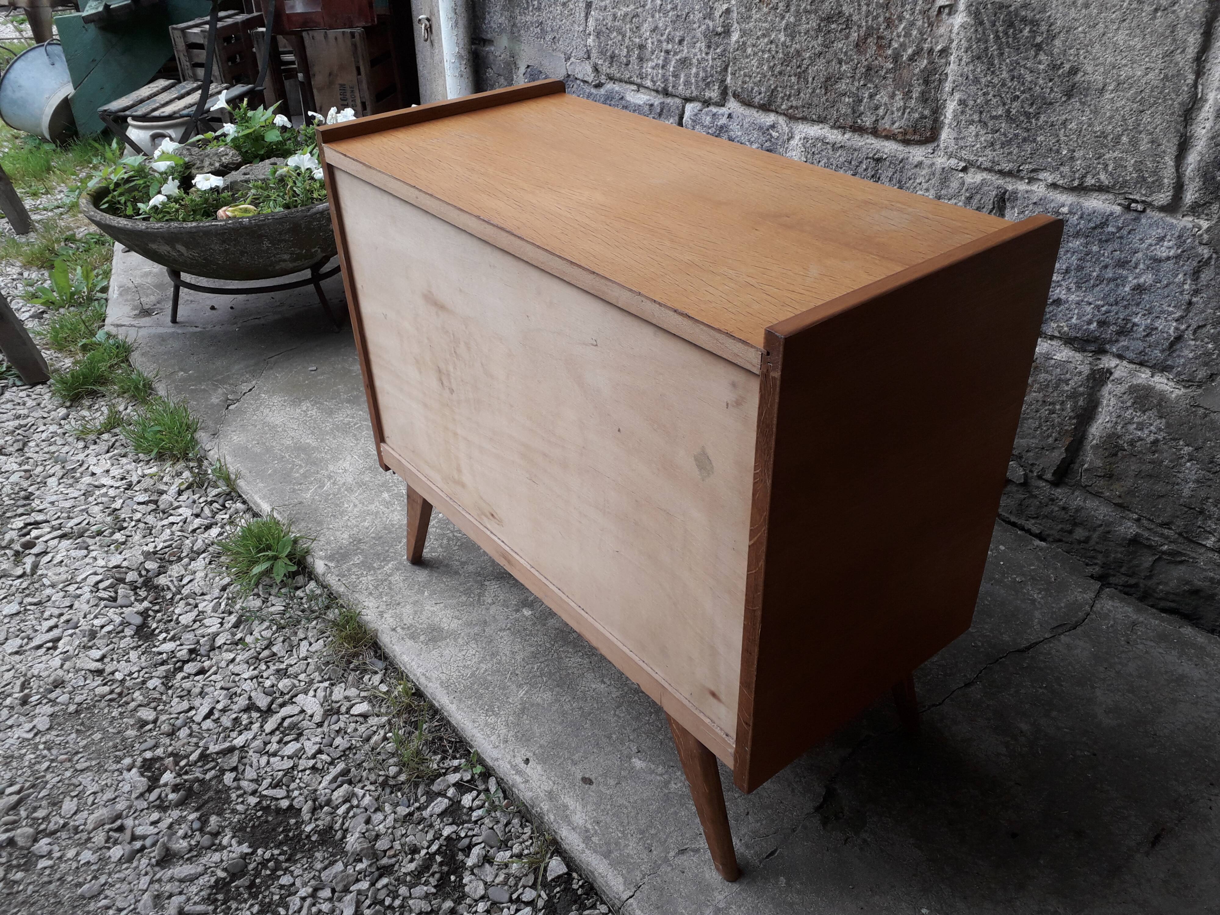 Vintage chest of drawers in rattan compass feet