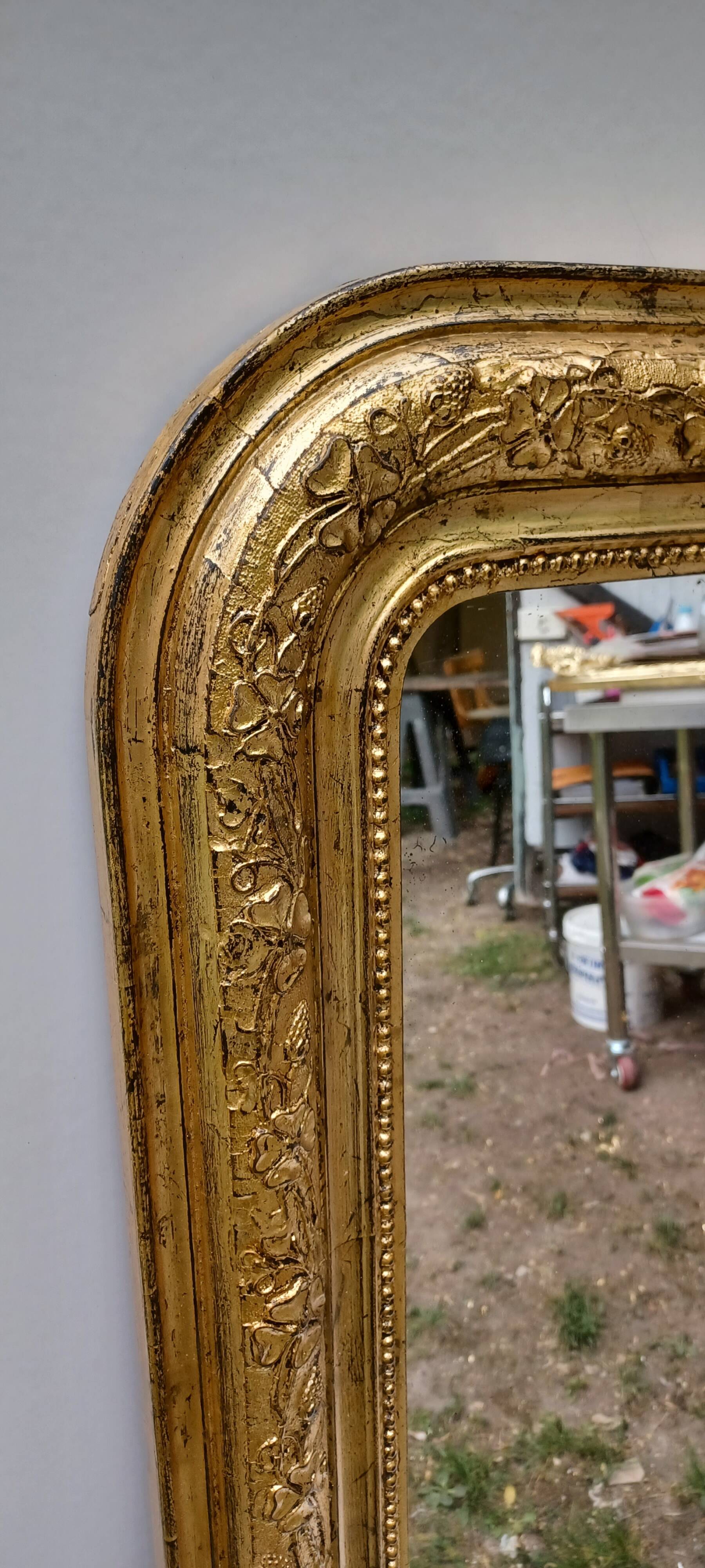Golden mirror in louis-philippe style around 1870