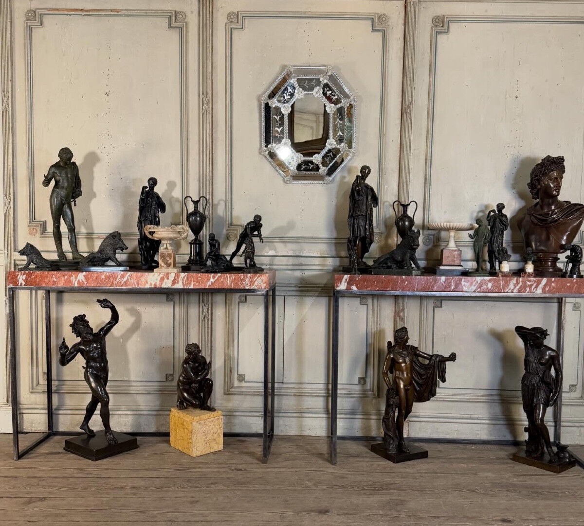 Pair of contemporary consoles in marble and metal.