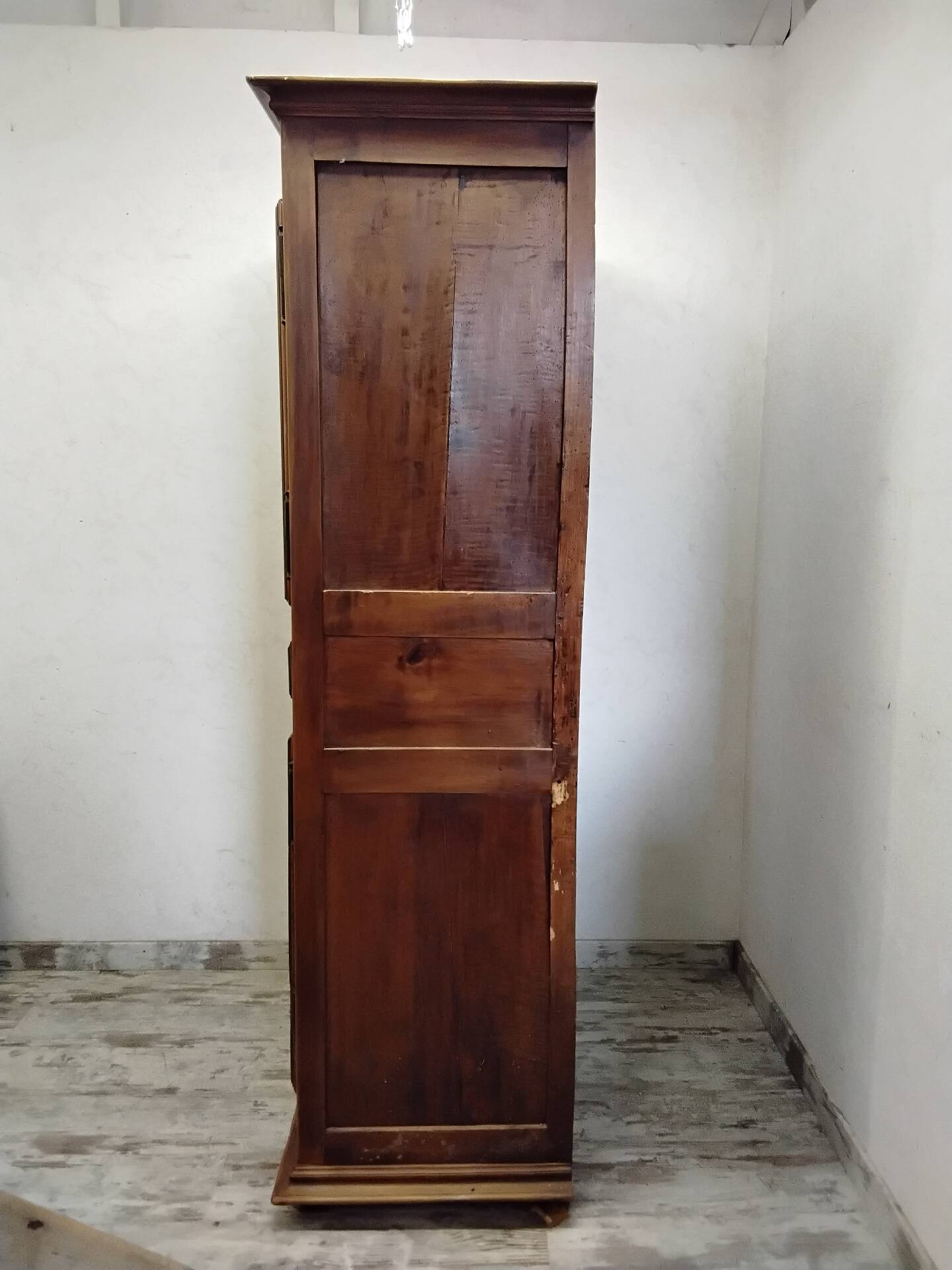 Antique wardrobe standing man