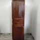 Antique wardrobe standing man
