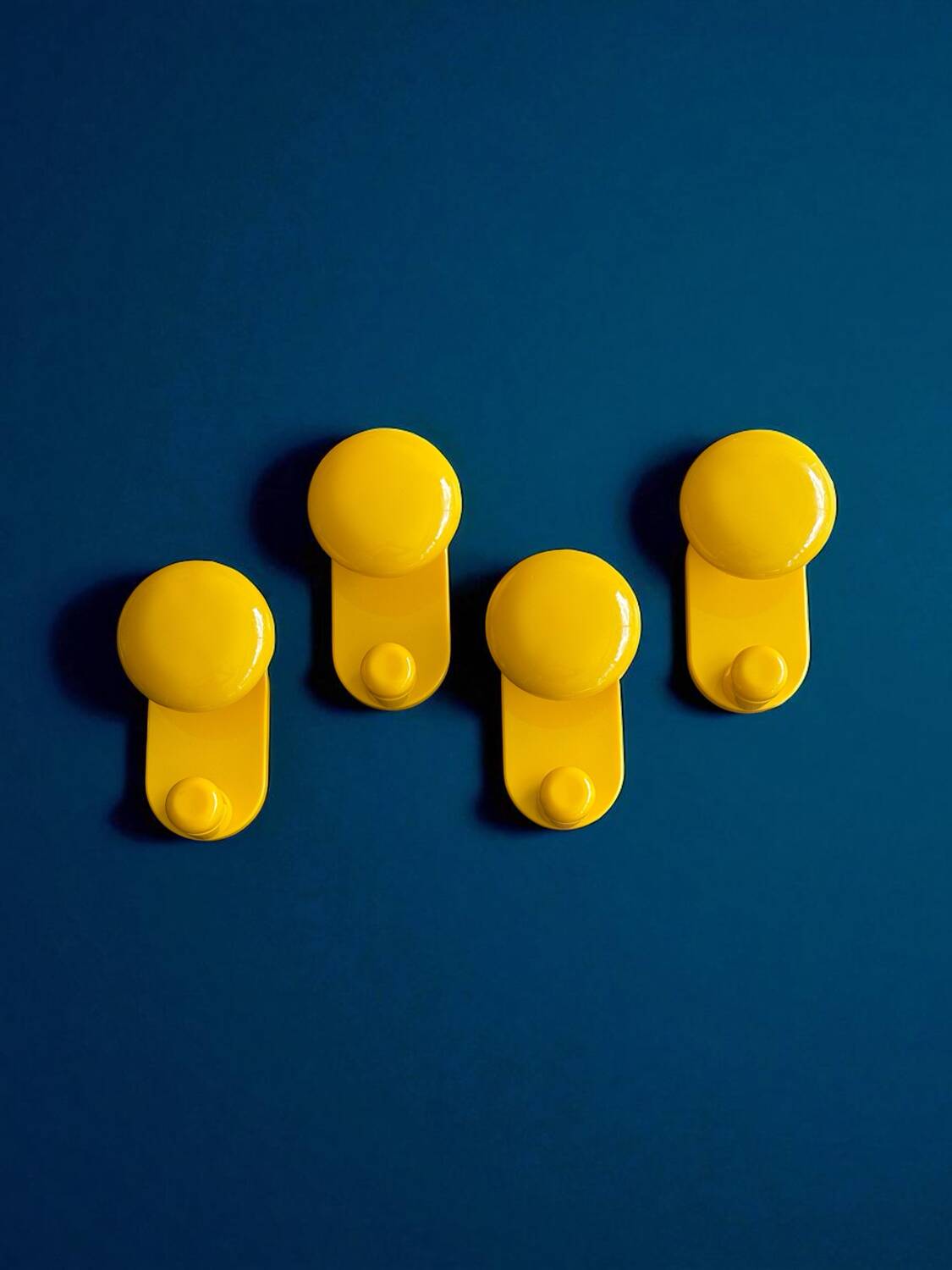 Yellow coat hooks by Carlo Bartoli, Italy 1970