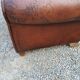 Paire de fauteuils club en cuir brun des années 30