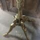Coat holder on onyx and gold metal foot