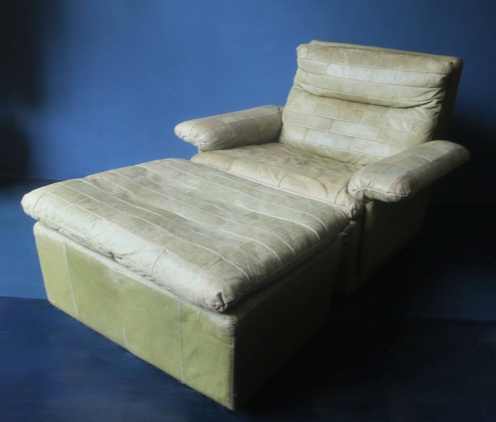 Patchwork leather olive green lounge chair and ottoman by Laauser, 1970s