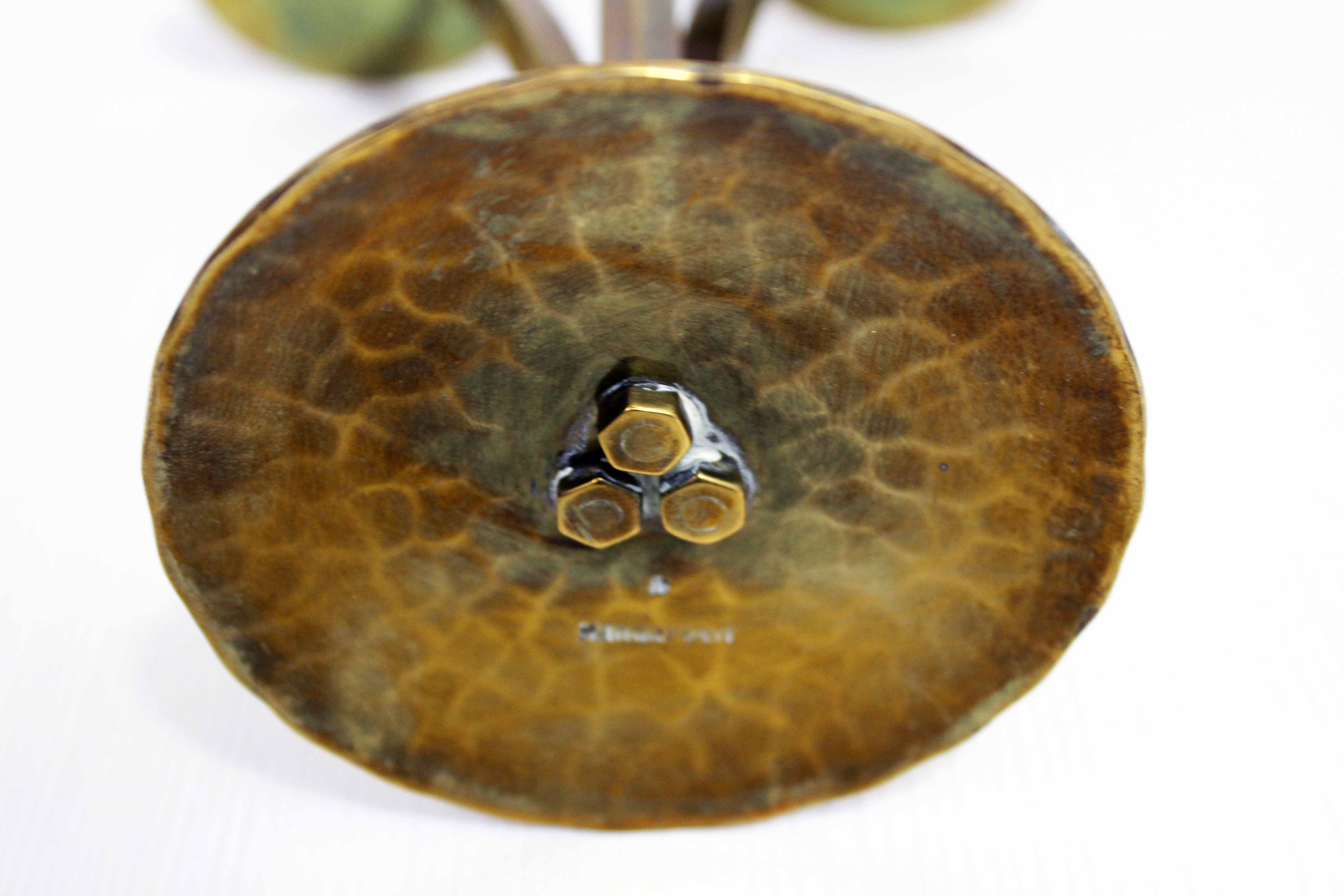 Triple brass candle holder