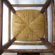 Ancient wooden and straw stool
