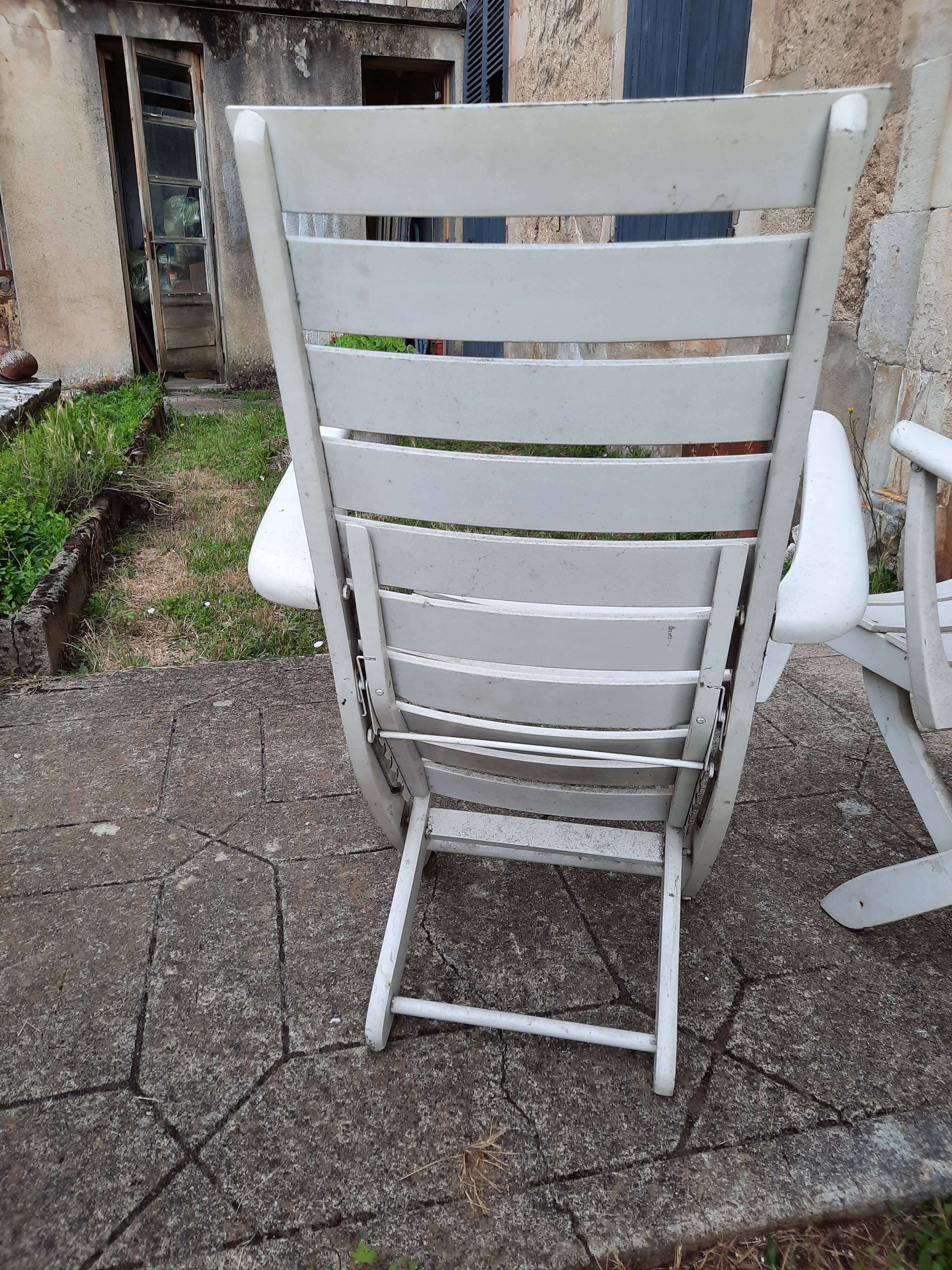 Pair of wooden garden armchairs