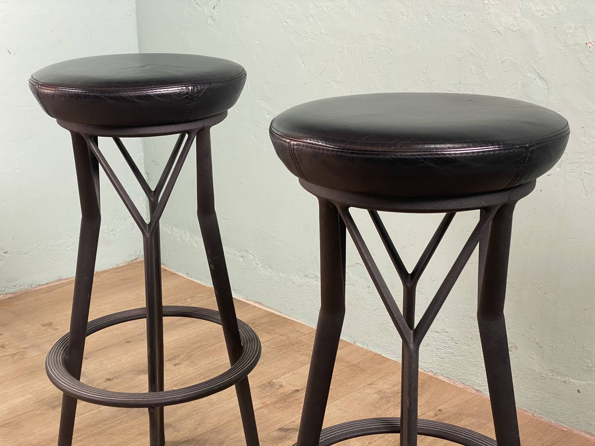 2 Yamakado designer swivel stools in black leather