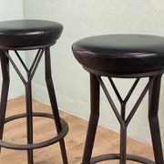 2 Yamakado designer swivel stools in black leather