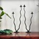 Pair of postmodern brutalist candlesticks in wrought iron, France, 1980s