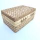 Suitcase in rattan and woven wicker