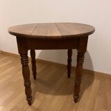 Small round cherry table, turned legs