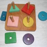 Wooden game stacking geometric shapes
