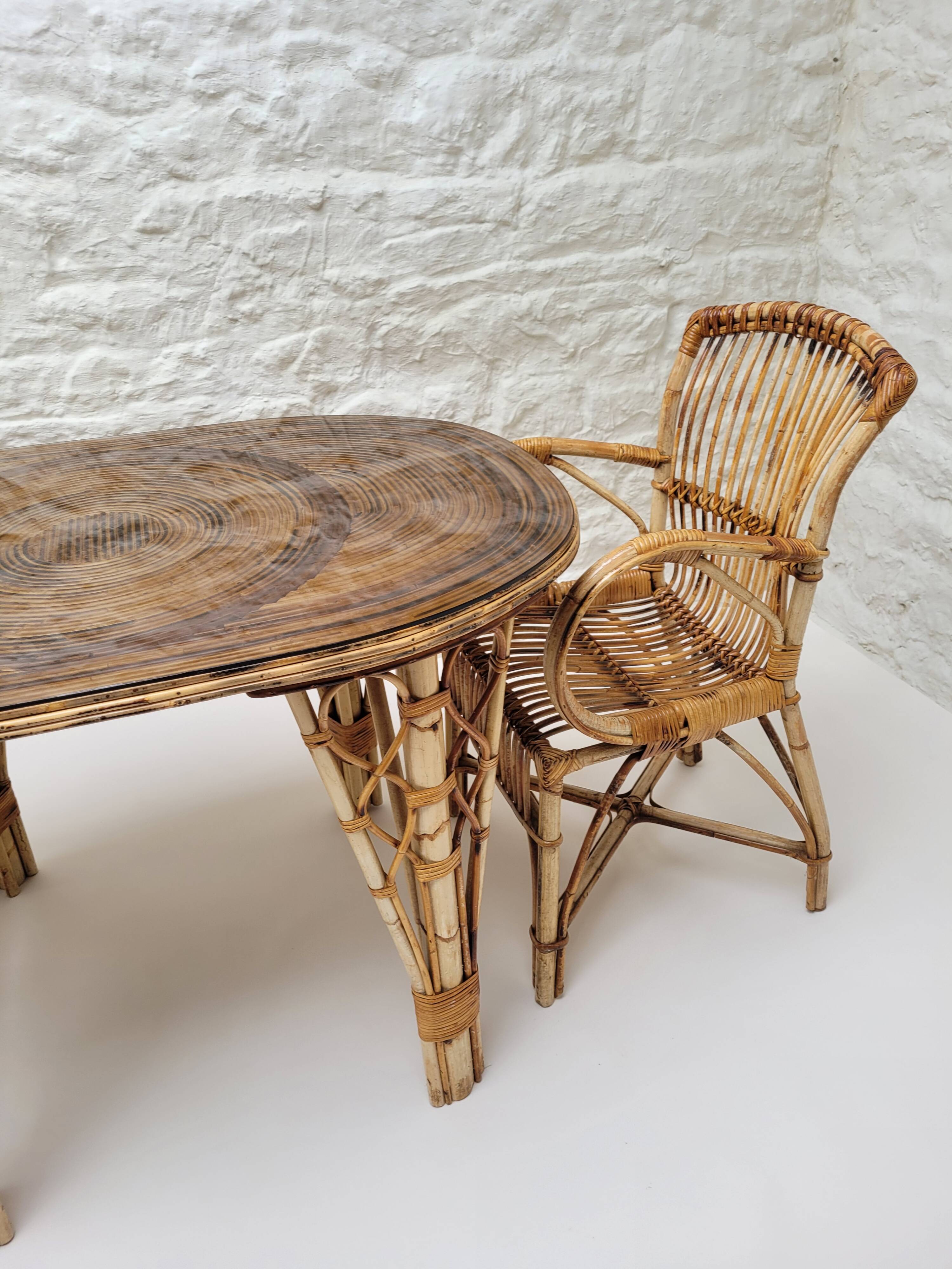 Vintage Audoux Minet bamboo, rattan, and smoked glass table duo.