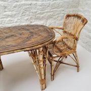 Vintage Audoux Minet bamboo, rattan, and smoked glass table duo.