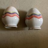 Set of 4 egg cups with their spoons, salt shaker, colored pepper shaker