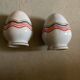 Set of 4 egg cups with their spoons, salt shaker, colored pepper shaker