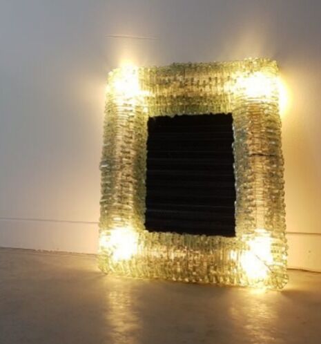 Brutalist mirror in postmodernist glass shard 1980