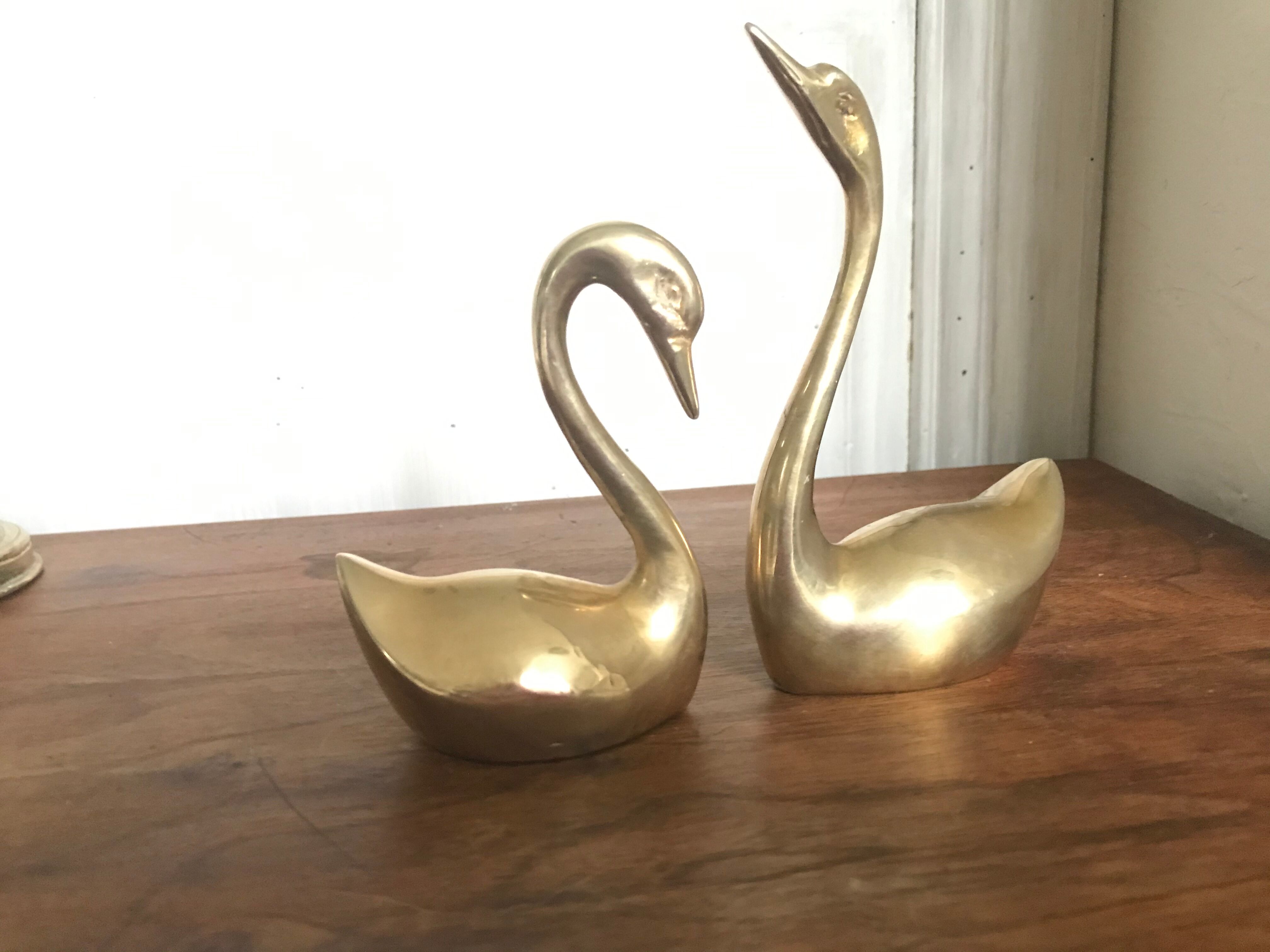 Couple of brass swans