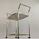 Serves golden trolley bar with wheels, in golden brass of the 80'S